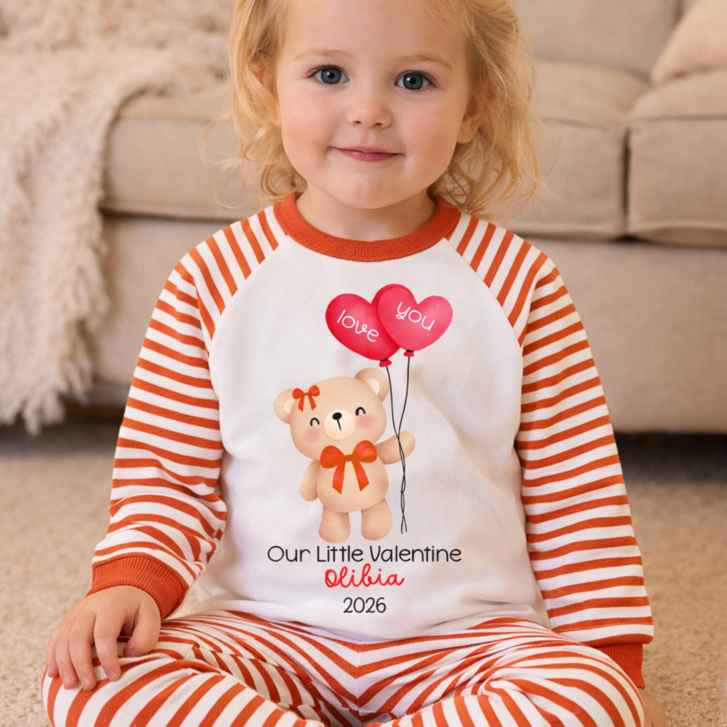 Child wearing personalised Valentine’s Day Child wearing personalised Valentine’s Day pyjamas