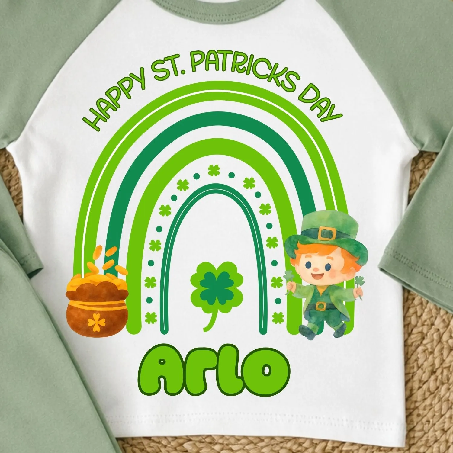 Child wearing personalised St Patrick’s Day pyjamas with rainbow and leprechaun design, name Arlo