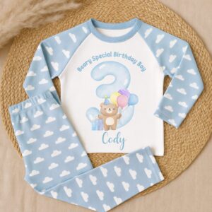 Toddler wearing personalised beary special birthday boy pyjamas with blue number three