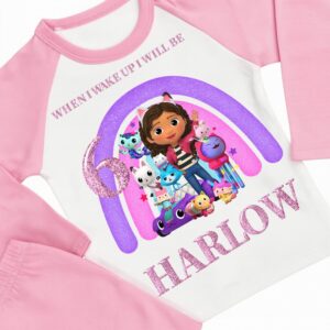 Personalised Gabby’s Dollhouse birthday pyjamas with pink striped sleeves and glitter rainbow design