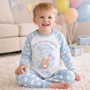 Blue striped birthday boy pyjamas with teddy balloon design
