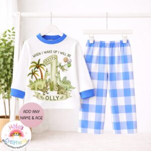 Personalised dinosaur birthday pyjamas with custom name Olly and age one on blue striped pyjama set