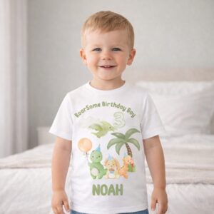 Toddler wearing personalised dinosaur birthday t-shirt with custom name and age