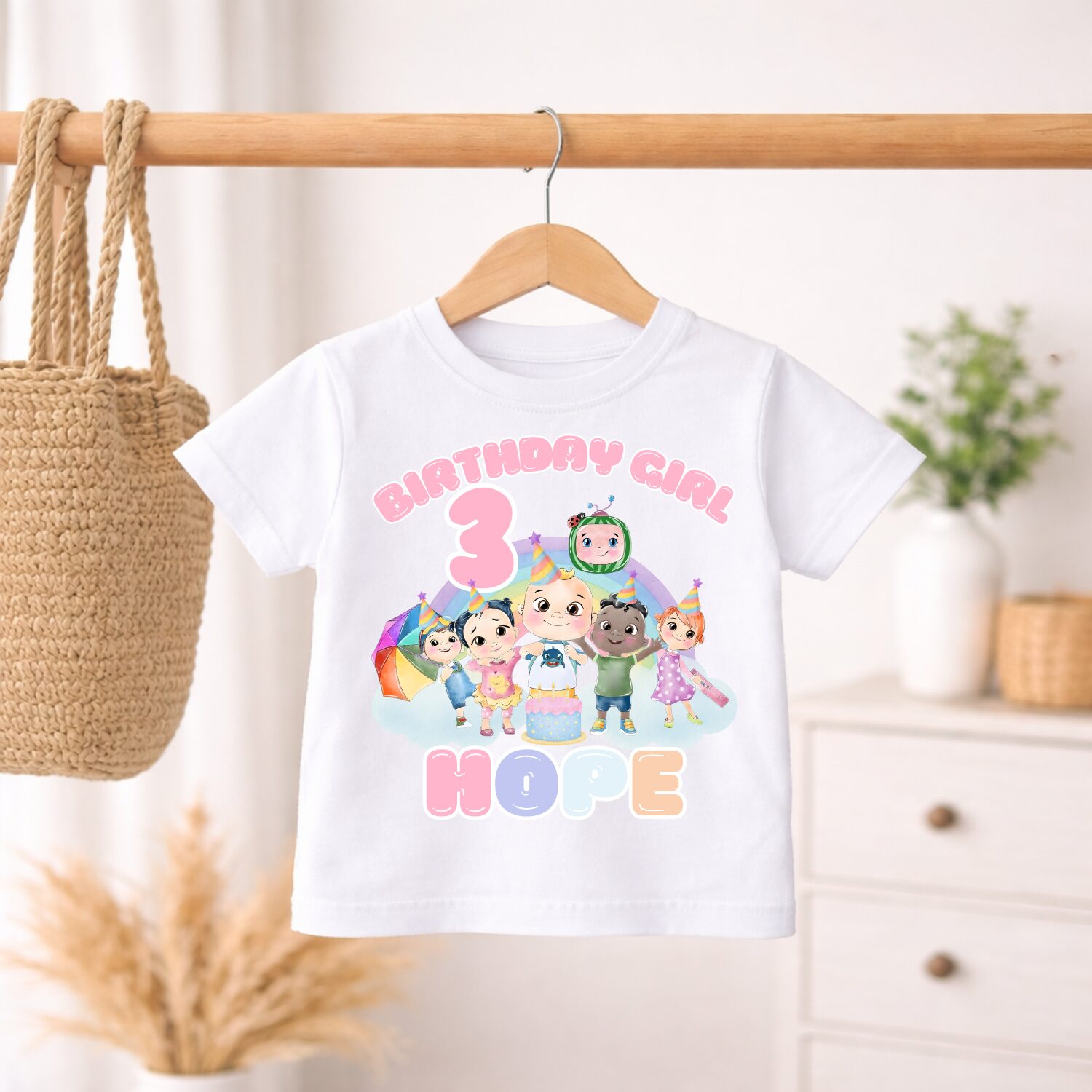 Toddler girl wearing personalised Cocomelon Birthday Girl T Shirt with custom age