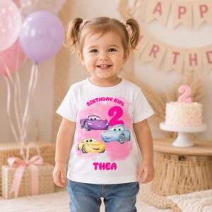 Custom pink racing car birthday shirt for girls with personalised name and age displayed with children's clothing