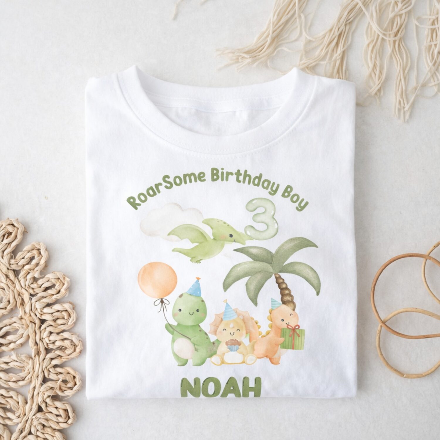 Personalised dinosaur birthday outfit for boys with watercolour dinosaur birthday design