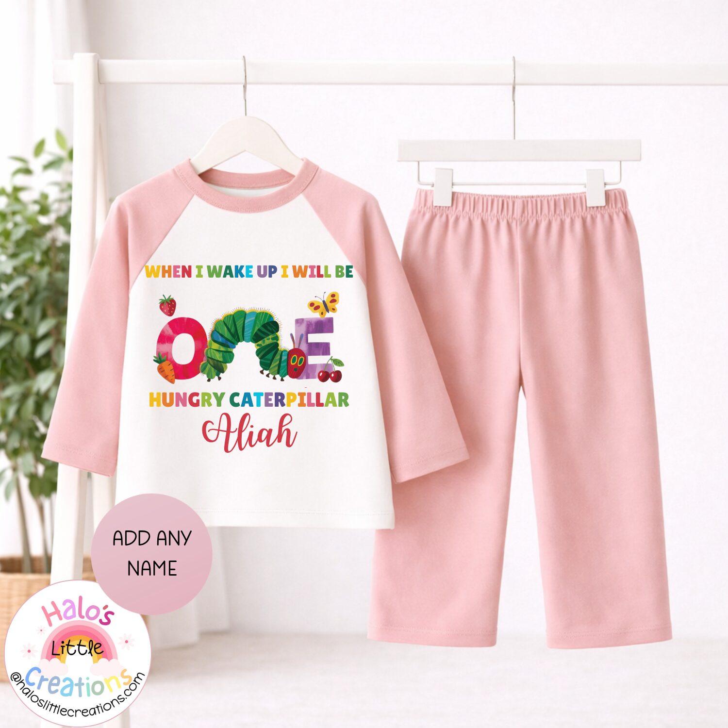 Plain pink personalised Hungry Caterpillar pyjamas for first birthday