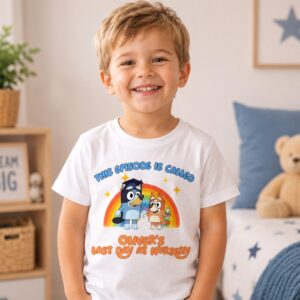 Young boy wearing personalised Bluey inspired last day at nursery t-shirt with rainbow design and custom name Oliver