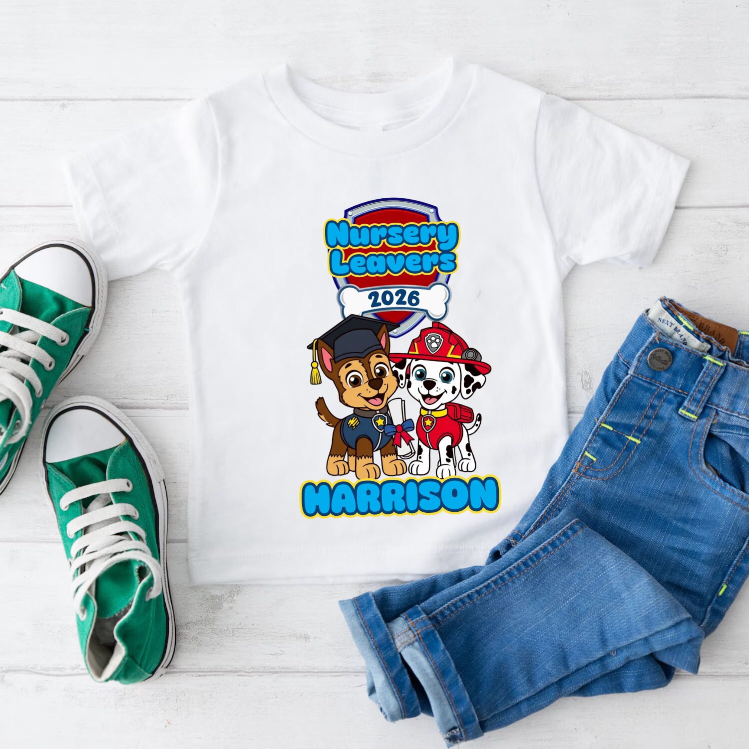 Young boy wearing personalised Paw Patrol inspired Nursery Leavers 2026 t-shirt with custom name