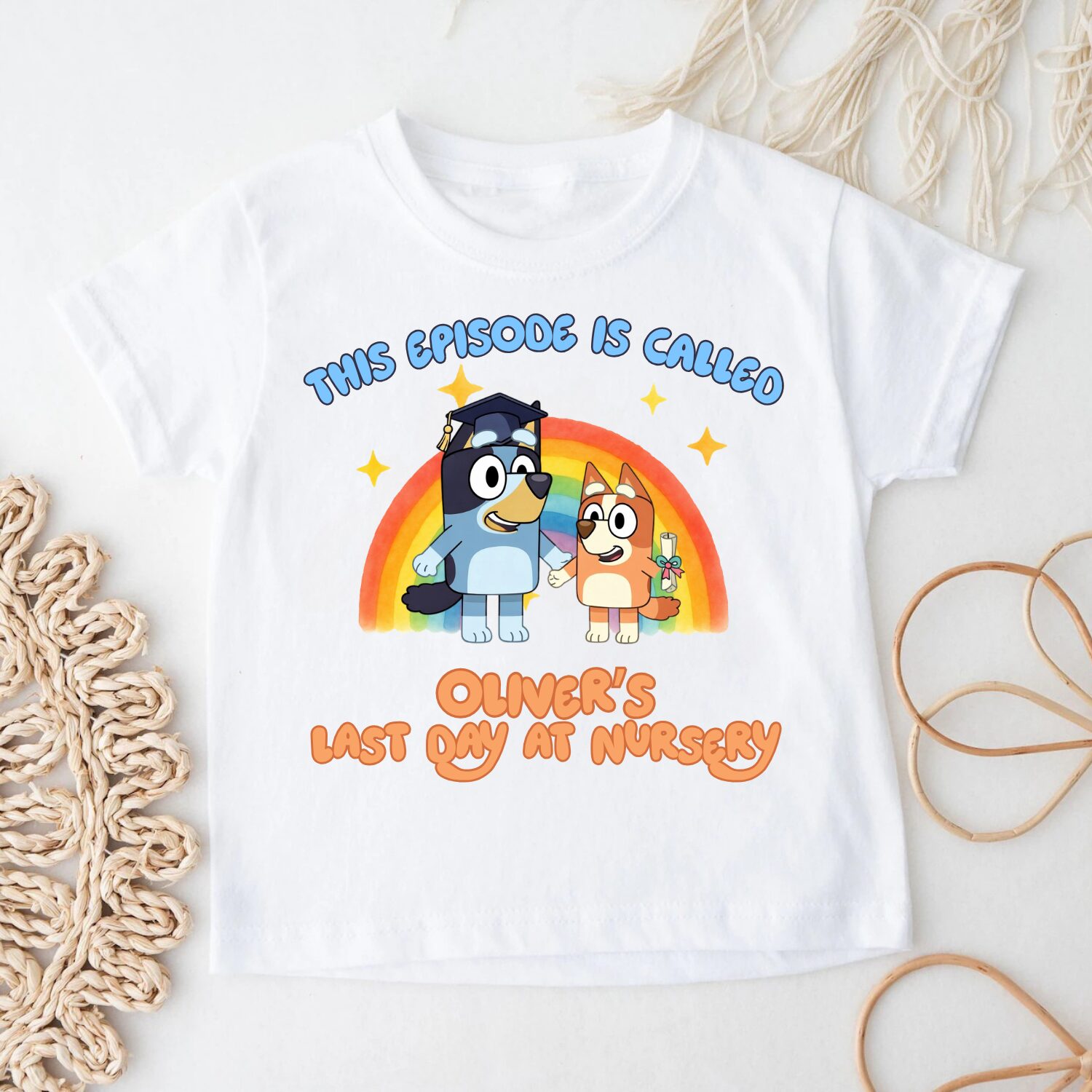Custom Bluey inspired nursery leavers t-shirt displayed with children's jeans and trainers