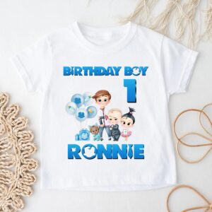 Personalised Boss Baby birthday girl t shirt with custom name Olivia and age 2 displayed in flatlay birthday outfit