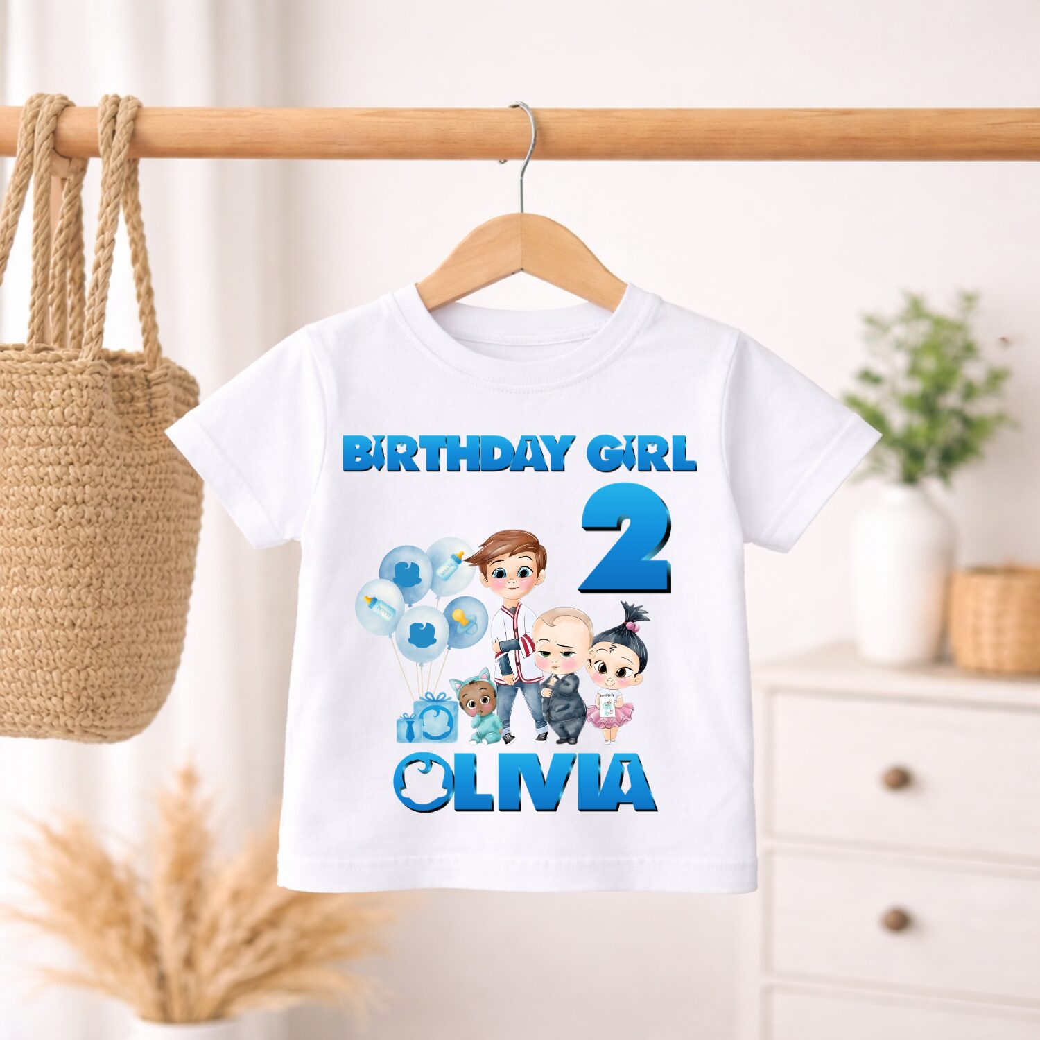 Personalised Boss Baby birthday girl t shirt with custom name Olivia and age 2 hanging display mockup