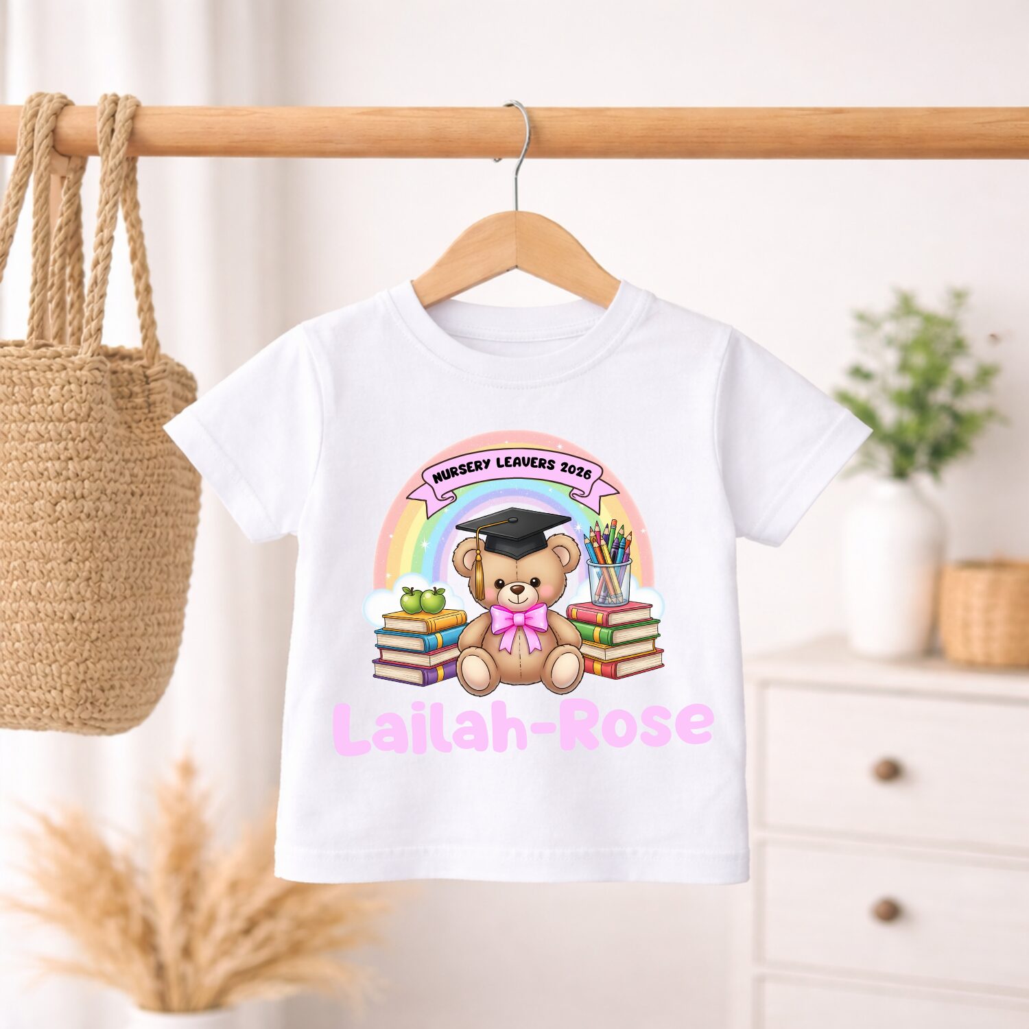Custom Nursery Leavers 2026 teddy bear t-shirt displayed with children's jeans and trainers