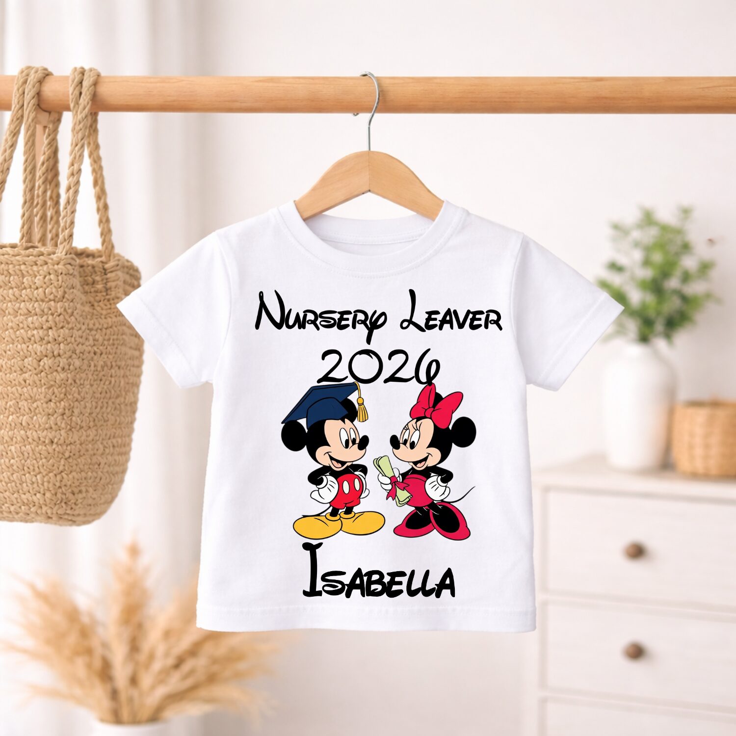 Young girl wearing personalised Mickey and Minnie inspired Nursery Leavers 2026 t-shirt with custom name