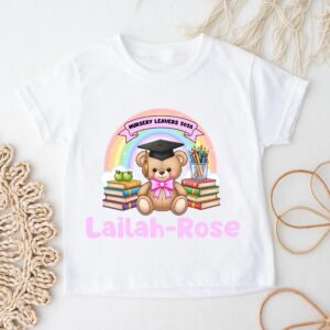 Young boy wearing personalised Nursery Leavers 2026 teddy bear graduation t-shirt with custom name