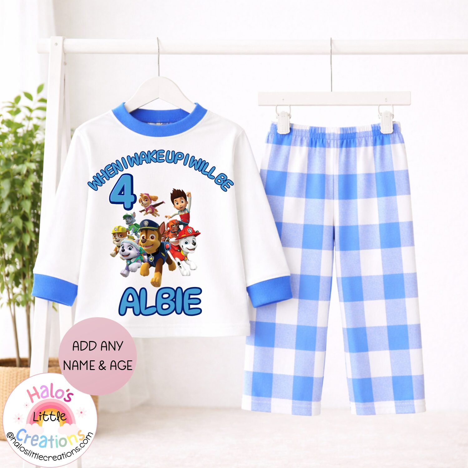 Personalised blue check Paw Patrol birthday pyjama set for children featuring any name and age.