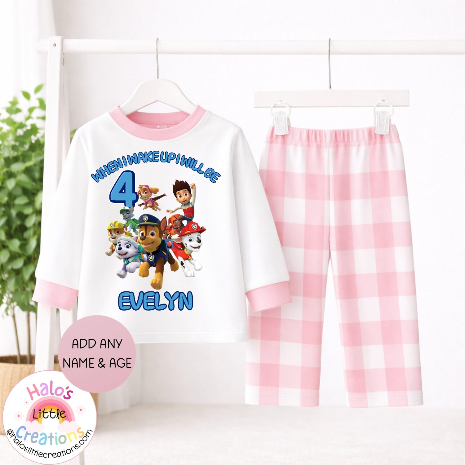 Personalised pink check Paw Patrol birthday pyjama set featuring custom name and age.