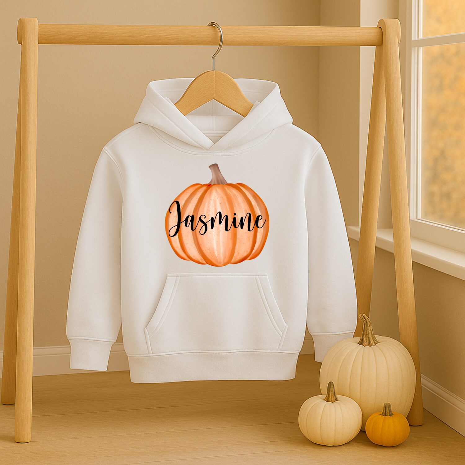 Personalised children's autumn hoodie with orange pumpkin and custom name