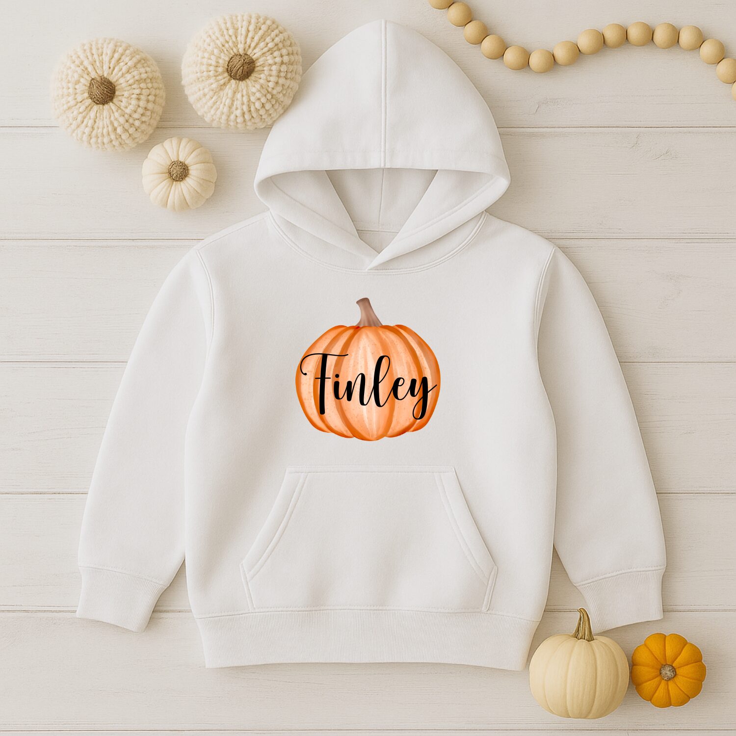 Personalised white kids hoodie with orange pumpkin and custom name autumn design