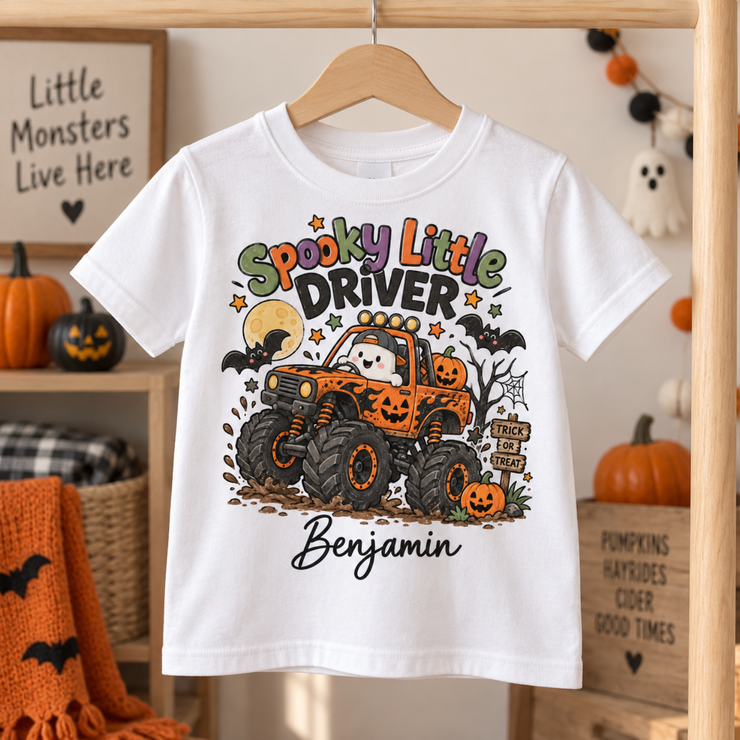 kids monster truck halloween tshirt hanging Personalised kids Halloween T-shirt with Spooky Little Driver monster truck design and child's name