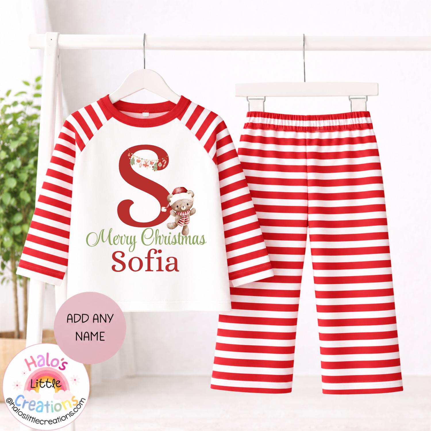 Personalised red and white striped Christmas pyjamas for kids with festive initial, Christmas teddy bear and name Sofia.
